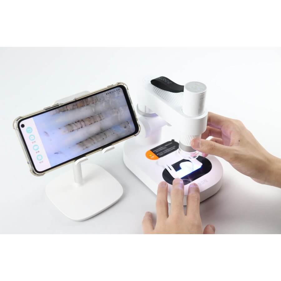 Microscopio digitale DiProgress M1A visualizza immagini su smartphone per osservazione minerali, insetti, piante con ingrandimento 10x-200x.